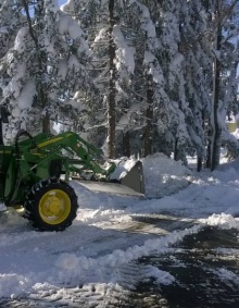 tractor plowing snow. 