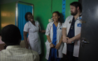 Nursing students Aba-Fynn-Aikins, center, and Seth Wagner, right, visited each unit in Donkorkrom Hospital in rural Ghana to learn and assist patients. Photo: Jordi Owusu