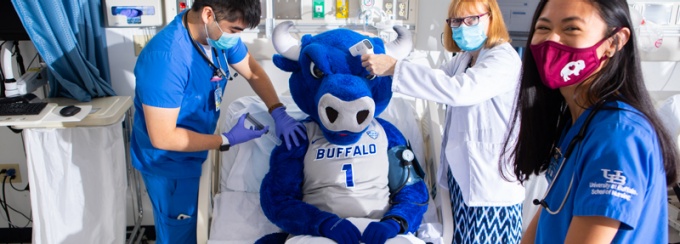Nursing students with University mascot. 